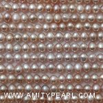 3786 freshwater potato pearl strand about 4-4.5mm peach pink